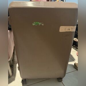 DKNY Tan Rolling Luggage